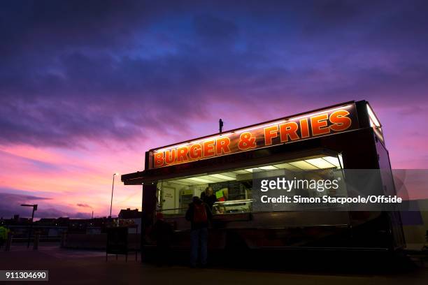 Burger van is lit up at sunset ahead of The Emirates FA Cup Fourth Round match between Liverpool and West Bromwich Albion at Anfield on January 27,...