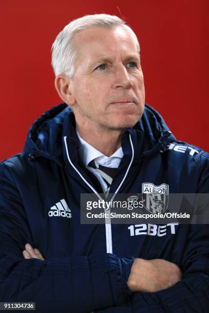 West Brom manager Alan Pardew looks on before The Emirates FA Cup Fourth Round match between Liverpool and West Bromwich Albion at Anfield on January...