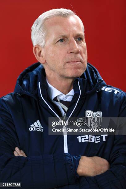 West Brom manager Alan Pardew looks on before The Emirates FA Cup Fourth Round match between Liverpool and West Bromwich Albion at Anfield on January...