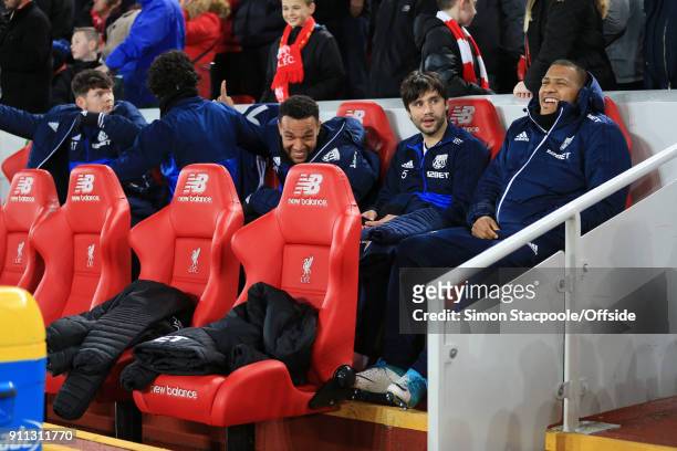 Jose Salomon Rondon of West Brom laughs as he sits on the bench alongside fellow substitutes Claudio Yacob of West Brom and Matt Phillips of West...