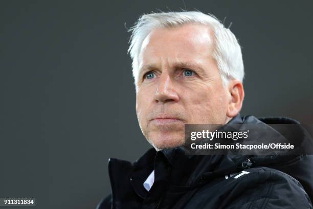 West Brom manager Alan Pardew looks on during The Emirates FA Cup Fourth Round match between Liverpool and West Bromwich Albion at Anfield on January...