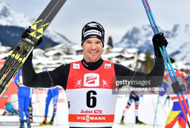 Dario Cologna of Switzerland celebrates winning the Mens FIS Cross Country 15 km Mass Start World Cup on January 28, 2018 in Seefeld, Austria / AFP...