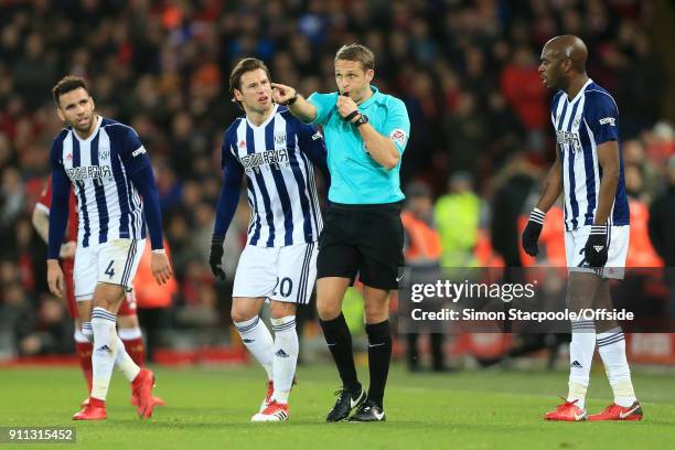 Referee Craig Pawson points to award a penalty following a decision to refer to the Video Assistant Referee system as Hal Robson-Kanu of West Brom ,...