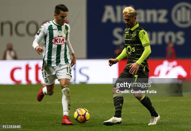 Sporting CP midfielder Ruben Ribeiro from Portugal with Vitoria Setubal midfielder Joao Teixeira from Portugal in action during the Portuguese League...