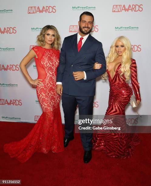 Adult film actress Shy Love, adult film actor Romeo Mancini and adult film actress Nikki Delano attend the 2018 Adult Video News Awards at the Hard...