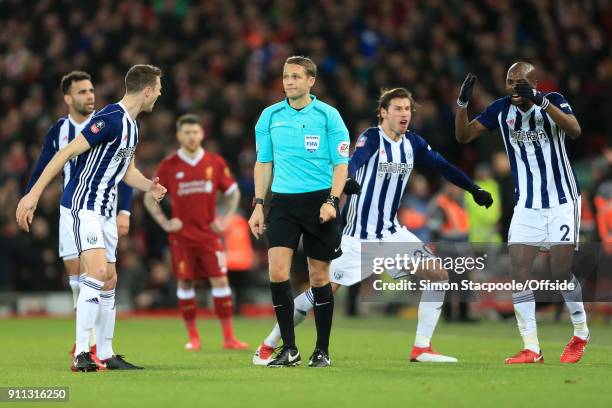 Jonny Evans of West Brom , Grzegorz Krychowiak of West Brom and Allan-Romeo Nyom of West Brom react after referee Craig Pawson awarded a penalty...