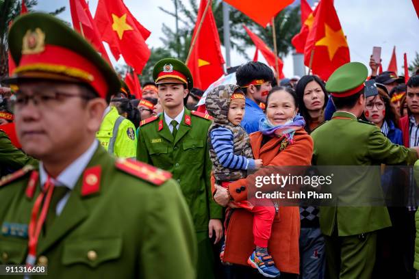 Thousands of Vietnamese soccer fans pour into Hanoi's city center to celebrate U-23 Vietnam's silver medals at the Asian Football Confederation's...