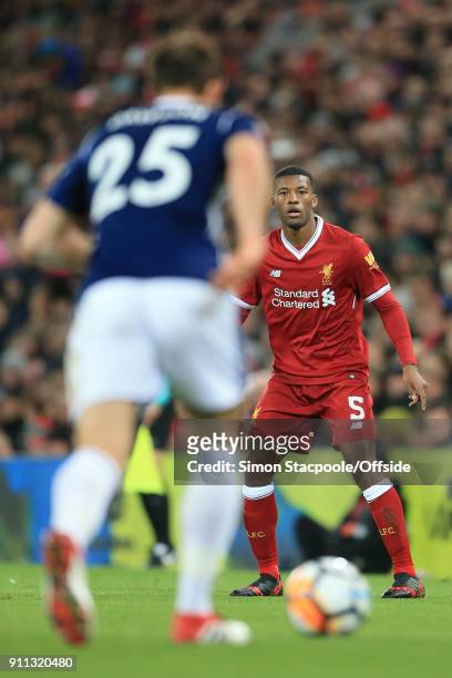 Georginio Wijnaldum of Liverpool watches as Craig Dawson of West Brom clears the ball during The Emirates FA Cup Fourth Round match between Liverpool...