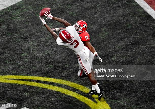 Calvin Ridley of the Alabama Crimson Tide is unable to make a catch in the end zone against Deandre Baker of the Georgia Bulldogs in the CFP National...