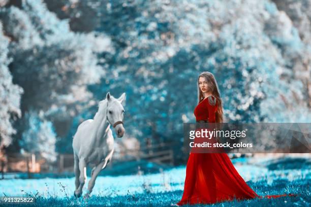 fashion model in nature near her horse - beautiful romanian women stock pictures, royalty-free photos & images