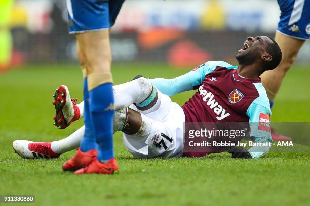 Pedro Mba Obiang of West Ham United reacts after a challenge during the The Emirates FA Cup Fourth Round match between Wigan Athletic and West Ham...