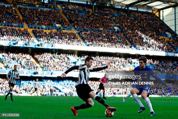 Newcastle United's Spanish midfielder Javier Manquillo vies with Chelsea's Spanish defender Marcos Alonso during the English FA Cup fourth round...