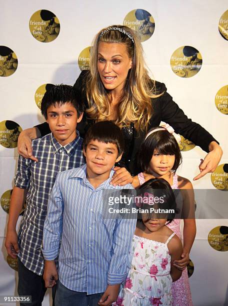 Actress Molly Sims and children from 'Tijuana CAsa Hogar Sion orphange' arrives at the '6th Annual Friends of El Faro Benefit' at Boulevard3 on...
