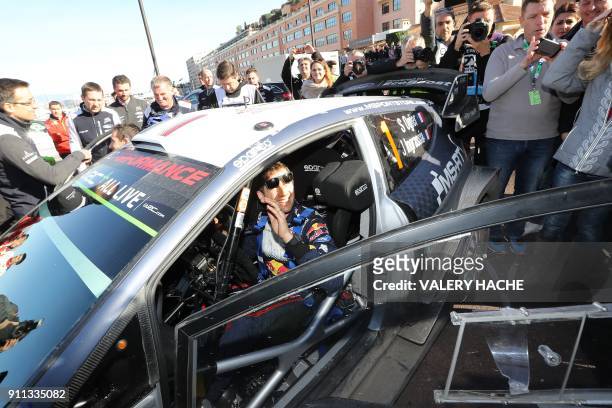 France's Sebastien Ogier smiles after winning the Monte Carlo Rally in Monte Carlo on January 28, 2018. The five-time defending world champion,...