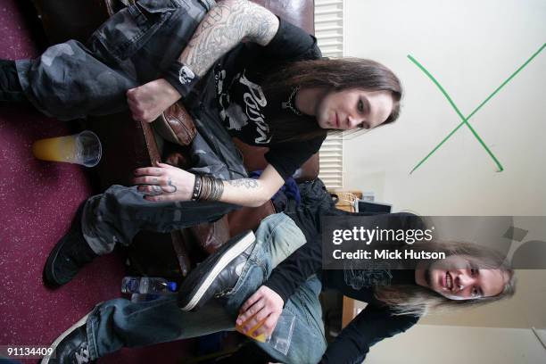 Alexi Laiho from Children Of Bodom and a fellow band member relax backstage in Finland in 2006
