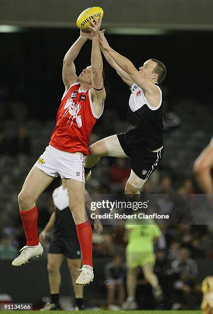 Sam Jacobs of the Bullants attempts to mark in front of Marc Greig of North Ballarat during the VFL Grand Final match between the North Ballarat...