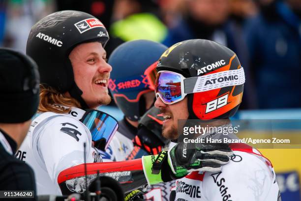 Manuel Feller of Austria takes 2nd place, Marcel Hirscher of Austria takes 1st place during the Audi FIS Alpine Ski World Cup Men's Giant Slalom on...