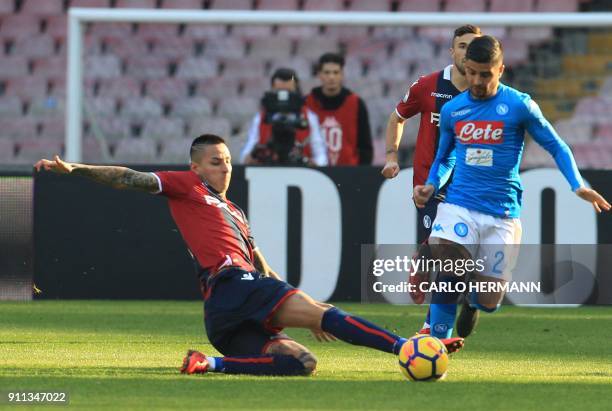 Napoli's Italian striker Lorenzo Insigne vies with Bologna's Chilean midfielder Erick Pulgar during the Italian Serie A football match SSC Napoli vs...