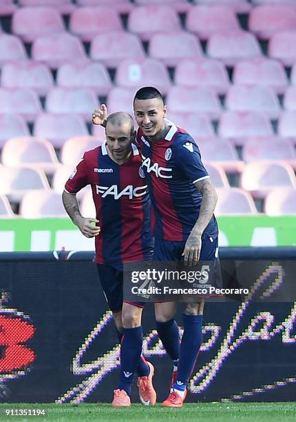 Erick Pulgar and Rodrigo Palacio of Bologna FC celebrate the 0-1 goal scored by Rodrigo Palacio during the serie A match between SSC Napoli and...