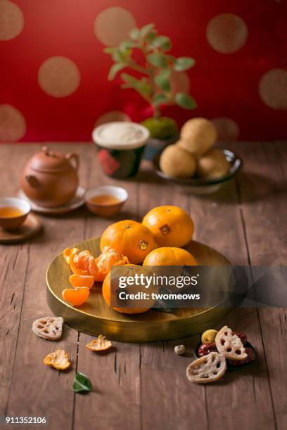 chinese new year food and drink still life. selective focus image. - lunar new year cup 2017 stock-fotos und bilder