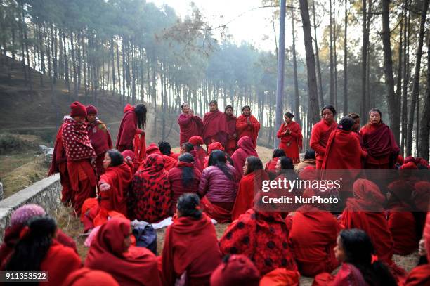 Nepalese Hindu woman arrives for the ritual procession at Changu Narayan Temple, Bhaktapur during Madhav Narayan Festival or Swasthani Brata Katha on...