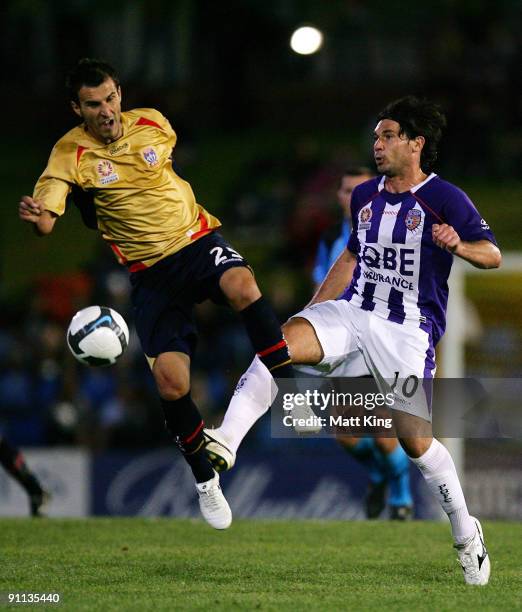 Labinot Haliti of the Jets and Wayne Srhoj of the Glory cjallenge for the ball during the round eight A-League match between the Newcastle Jets and...