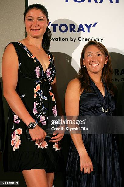 Dinara Safina of Russia and Ai Sugiyama of Japan pose during a press conference for the Toray Pan Pacific Open Tennis 2009 at Hotel Grand Pacific Le...