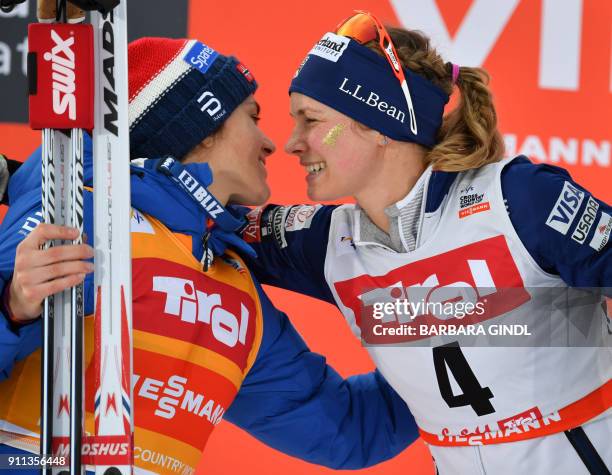 Heidi Weng of Norway and Jessica Diggins of the USA react after the Ladies FIS Cross Country 10 km Mass Start World Cup on January 28, 2018 in...