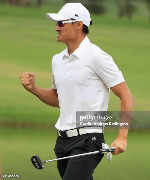 Haotong Li of China celebrates his birdie and victory on the 18th green during the final round of the Omega Dubai Desert Classic at Emirates Golf...