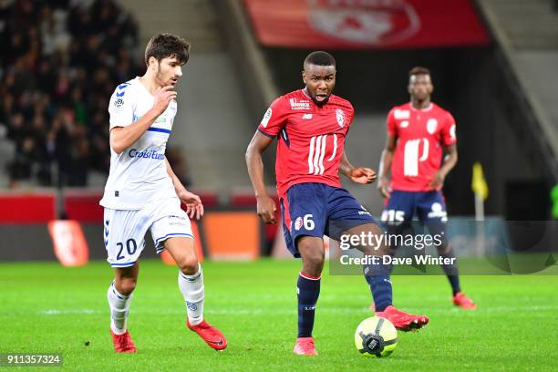 Ibrahim Amadou of Lille and Martin Terrier of Strasbourg during the Ligue 1 match between Lille OSC and Strasbourg at Stade Pierre Mauroy on January...