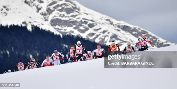 Athletes compete during the Ladies FIS Cross Country 10 km Mass Start World Cup on January 28, 2018 in Seefeld, Austria. / AFP PHOTO / APA / BARBARA...
