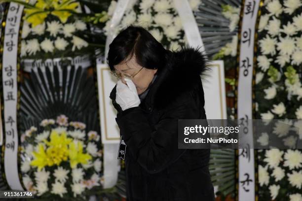 Jan 27, 2018-Miryang, South Korea-Mourners weep for victims at the South Korean Hospital Fire a Group Memorial Altar in Miryang, South Korea. A fire...