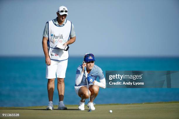 Lexi Thompson lines up her birdie puttt on the 8th hole during the second round of the Pure Silk Bahamas LPGA Classic at the Ocean Club Golf Course...