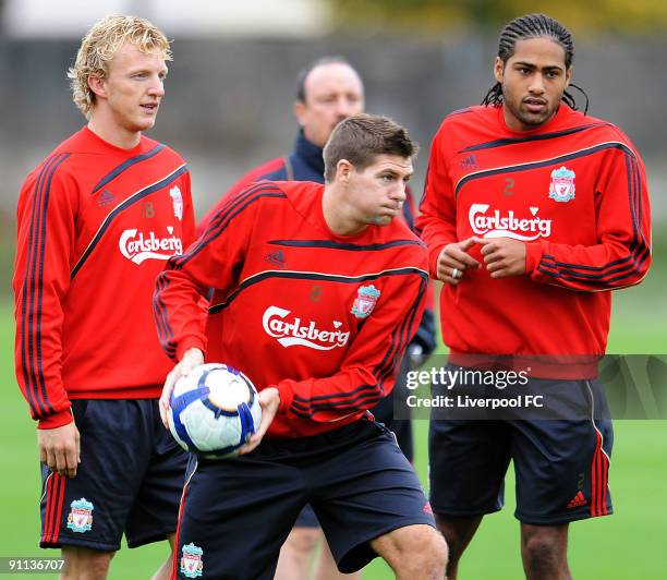 Dirk Kuyt, captain Steven Gerrard and Glen Johnson of Liverpool in action during a training session at Melwood on September 25, 2009 in Liverpool,...