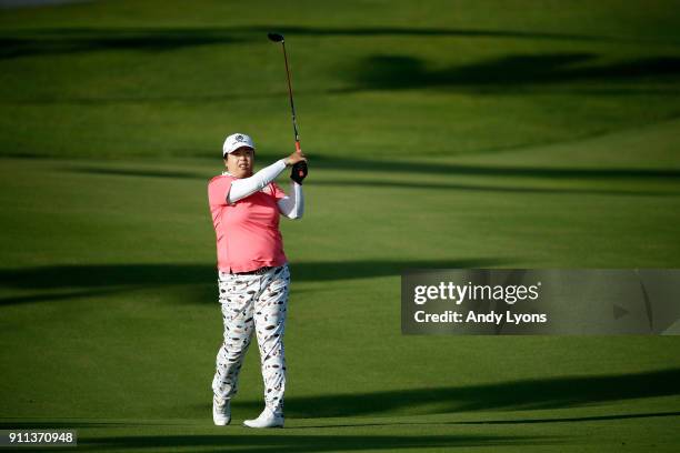 Shanshan Feng of China hits second shot on the 7th hole during the second round of the Pure Silk Bahamas LPGA Classic at the Ocean Club Golf Course...