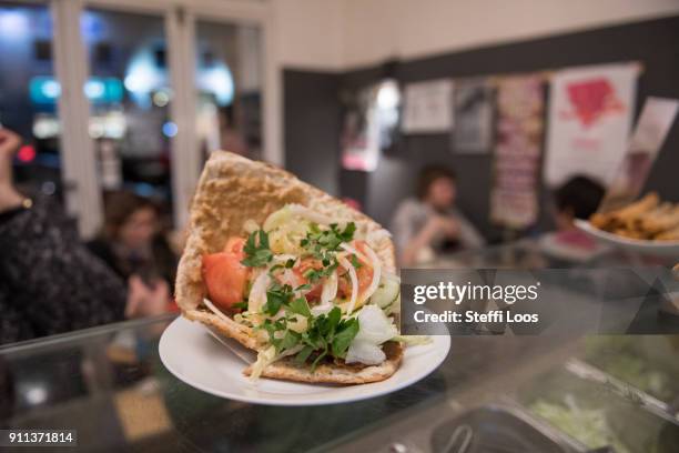 Vegan doner plate is pictured at vegan bistro Voener on January 25, 2018 in Berlin, Germany. Voener offers classic fast food dishes such as burger,...