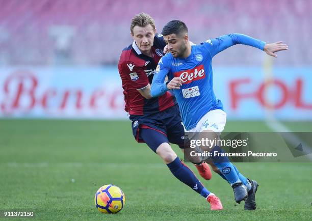 Player of SSC Napoli Lorenzo Insigne vies with Bologna FC player Ladislav Krejci during the serie A match between SSC Napoli and Bologna FC at Stadio...