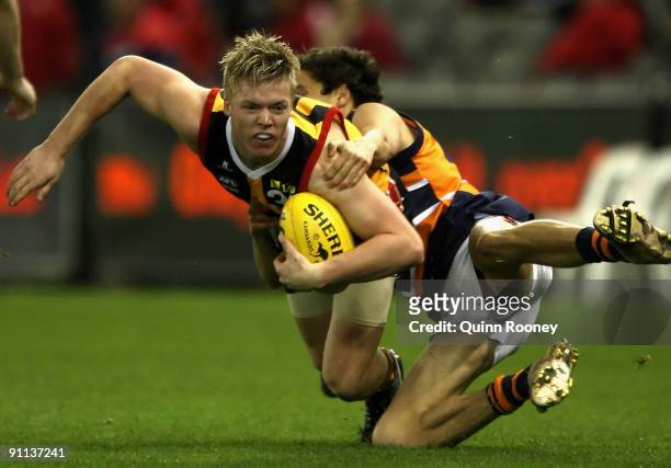 Corey Millard of the Stingrays is tackled during the TAC Cup Grand Final match between the Dandenong Stingrays and the Calder Canons at Etihad...