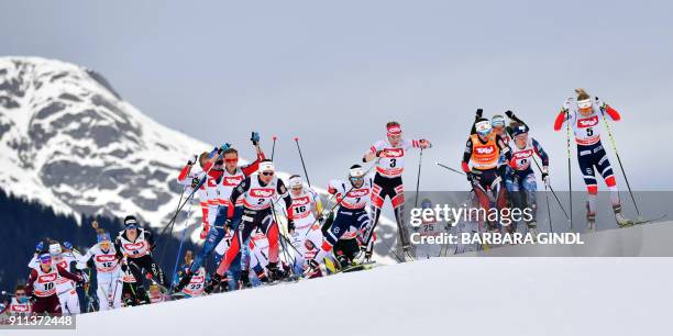 Athletes compete during the Ladies FIS Cross Country 10 km Mass Start World Cup on January 28, 2018 in Seefeld, Austria. / AFP PHOTO / APA / BARBARA...