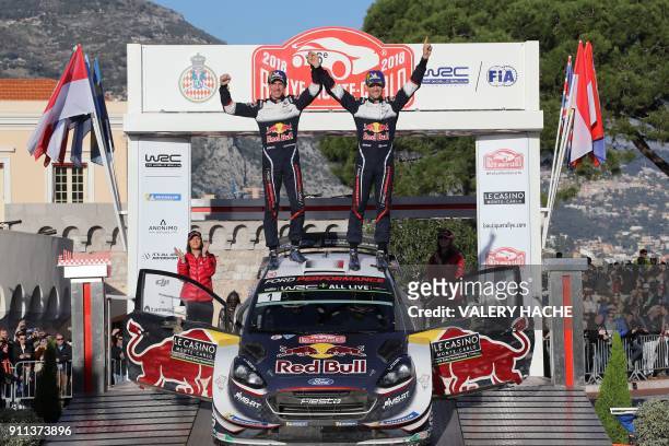 French driver Sebastien Ogier and French co-pilot Julien Ingrassia celebrate after winning the Monte Carlo Rally in Monaco on January 28, 2018. World...