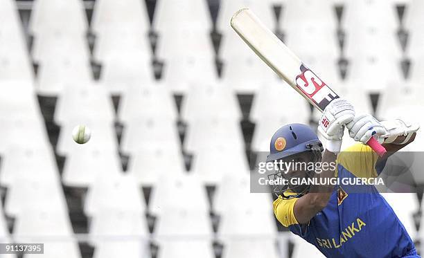 Sri Lanka's batsman Tilan Samaraweera hits a four on September 25, 2009 during the ICC Champions Trophy group match between England and Sri Lanka at...