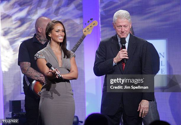 Singer Alicia Keys and former President Bill Clinton attend the Clinton Global Citizen Awards during the 2009 Clinton Global Initiative at the...