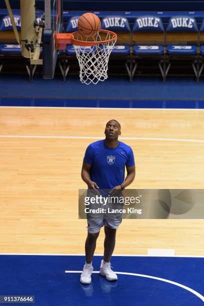 Special assistant Nolan Smith of the Duke Blue Devils watches a basketball prior to their game against the Virginia Cavaliers at Cameron Indoor...
