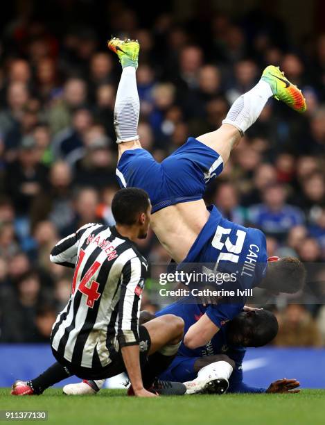 Gary Cahill of Chelsea collides with teammate N'Golo Kante and Isaac Hayden of Newcastle United during The Emirates FA Cup Fourth Round match between...