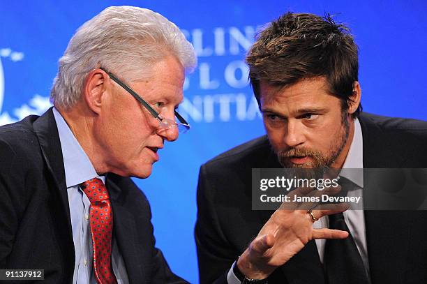 Former President Bill Clinton and actor Brad Pitt host an infrastructure special session during the 2009 Clinton Global Initiative at the Sheraton...