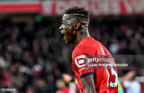 Lille's Portuguese defender Edgar Ie celebrates after scoring a goal during the French L1 football match between Lille and Strasbourg on Janaury 28...