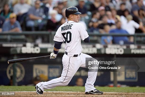 Adam Moore of the Seattle Mariners swings at the pitch during the game against the Chicago White Sox on September 17, 2009 at Safeco Field in...