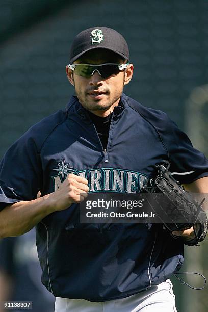 Ichiro Suzuki of the Seattle Mariners jogs onto the field during practice before the game against the Chicago White Sox on September 17, 2009 at...