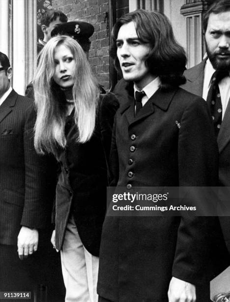 Photo of George HARRISON and Patti BOYD; with his wife Patti Boyd leaving court after being fined -·250.00 for possession of Cannabis