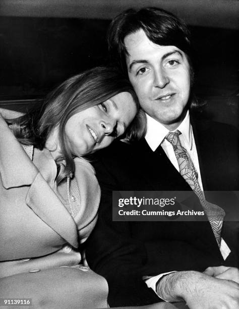 Photo of Paul McCARTNEY and Linda McCARTNEY; posed with Linda McCartney on wedding day